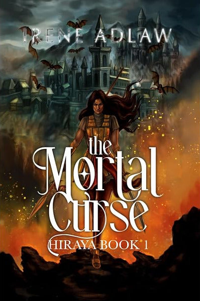 Cover of The Mortal Curse by Irene Adlaw. A brown woman clad in armor holding a spear walks toward the viewer in front of a fiery glow. In the background is a castle and mananaggal flying.