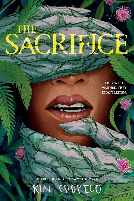Book cover of The Sacrifice with hands covered in vines hide a brown face.